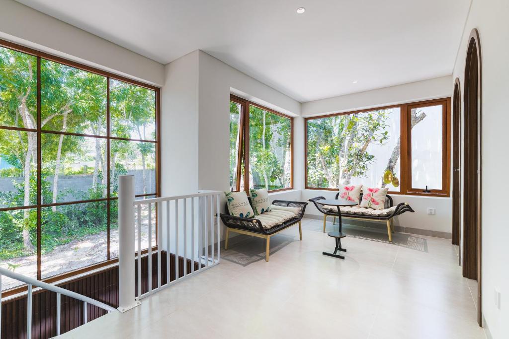 Relaxing sitting area with garden-facing windows