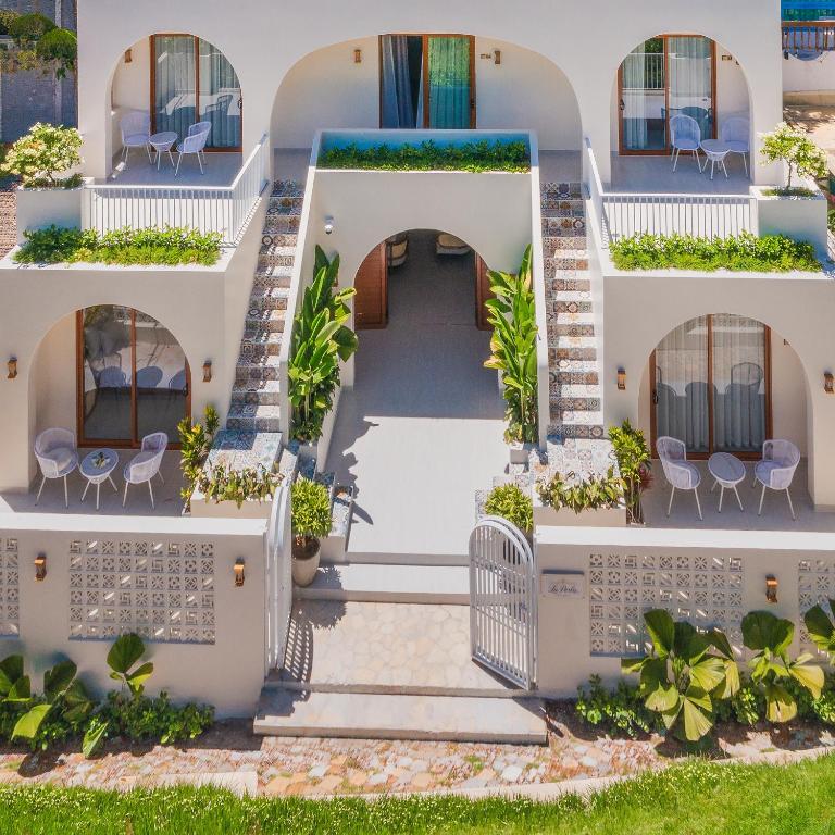 Peaceful courtyard surrounded by tropical greenery